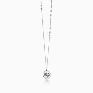 Return to Tiffany etched heart and arrow pendant